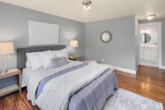 Primary bedroom with garden view!