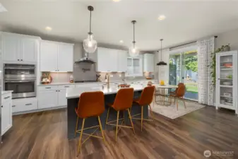 Timeless white shaker cabinetry with soft-close features
