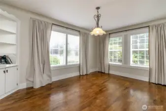 Beautiful dining room with built-in corner nook.
