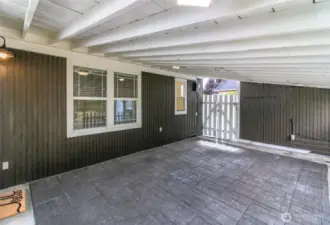 Extended living space with this covered patio off of the back of the home.