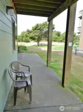 Rear Patio leading out to the Backyard.