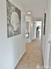 Hallway leading into the unit from the front door.
