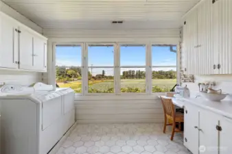 Amazing picturesque laundry/sewing room with views of the valley farming.