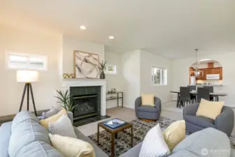 Large and light-filled westerly facing living room with gar fireplace..