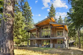 Back exterior view. This home is designed for effortless entertaining, inside and out.