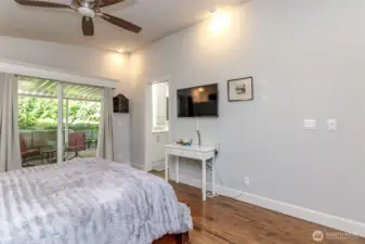 Primary Bedroom with back covered patio & shed