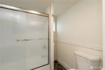 New Tile Surround in Hall Bathroom