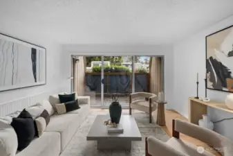 Light and bright, the spacious living room offers an open, airy feel with plenty of room to relax and entertain.