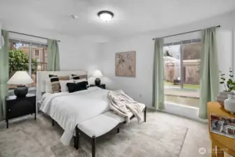 A fantastic primary suite offers new carpet, fresh paint, and the convenience of an attached bathroom.