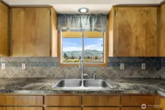 Kitchen window, newer sink and counters