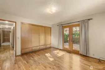 #1 Bedroom has french door to deck and generous closet