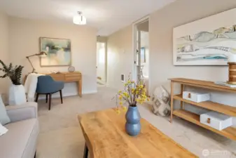 This 2nd living room is just off from the dining and main living room. So many uses - office, living space, short-term bedroom... Down the hallway is the 2nd (3/4) bathroom.