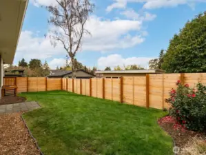 Another angle of the fully-fenced backyard.