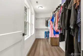 Huge Walk-in Closet with Water Views through Windows
