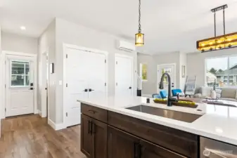 Extra storage in pantry closet and understairs closet