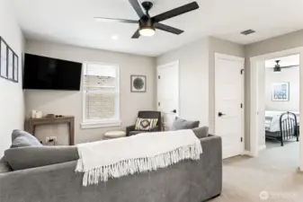 Upstairs loft space currently used as additional living room