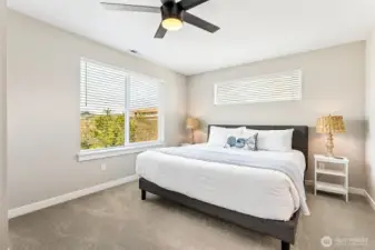 Spacious primary bedroom with attached bath