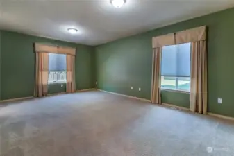 LARGE primary bedroom with 9ft ceilings.