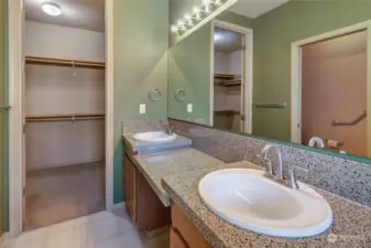 Attached primary bathroom with walk-in closet.