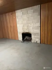 Downstairs Living room with fireplace.