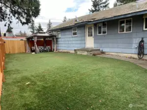 Astroturf fully fenced front yard