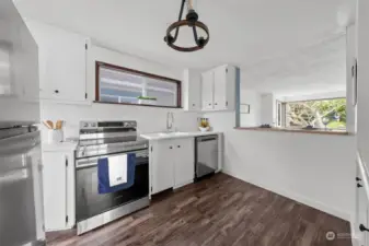 Eating bar in kitchen that opens to living room