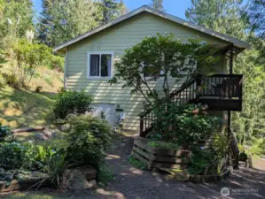 Side of home & entry to 2nd doorway.