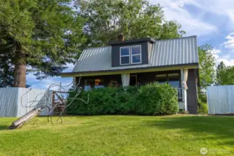 Historic charm that combines older and new features. Covered porch & open deck invites outdoor fun