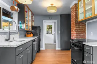 Step saving galley kitchen with country charm