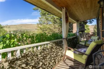 Kick back and watch the birds on the covered front porch