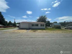 Corner lot facing north in nice clean setting for you to add a garden