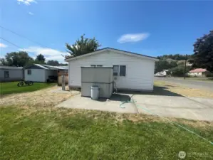Parking off street driveway with 4x6 shed.