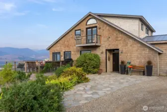 Welcome to a mountain top home with 3,637 SF in Winthrop! Blue Montana stone patio & front door to this gorgeous 3 Bed/3 Bath Craftsman style home. Views, Gardens, Decks, Garage, Barn, Shop and more!  Mountains and river greet your everyday.