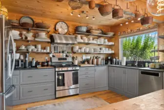 Well appointed kitchen enjoys stainless steel appliances, Dekton countertops, gracious cabinetry, deep stainless sink. Solid hardwood floors.