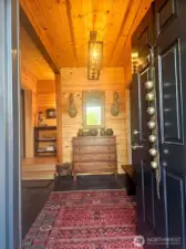 Front door opens to a gracious entry foyer. Bright & beautiful slate floor, deconstructed Coat & Boot closet, Wood bench. Welcoming all family and friends to your home.