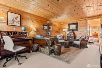 Loft Office and den nestled next to the primary bedroom. Balcony & stairs to North deck from this room.