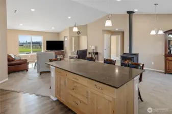 View from Kitchen into living space & dining area.