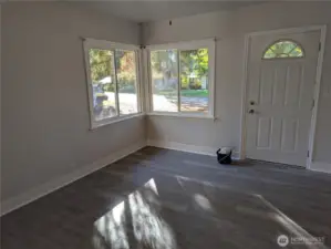 Living room with front entrance door