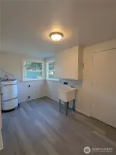 Large utility room with washer and dryer hookups