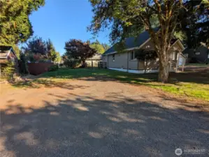 Extra parking next to the side of the house is par of the property