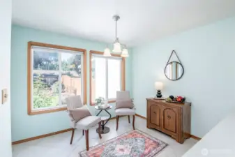 Kitchen dining nook space. Imagine drinking your coffee/tea and looking out to the gorgeous flowers/yard.