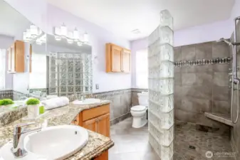 Primary ensuite bath, dual vanities and walk in shower.