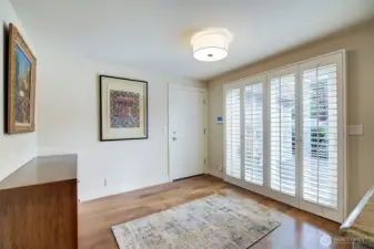 Bonus area perfect for making dinners plans/menus with desk or extra eating area. Opens up to private small patio for that morning cup of coffee.