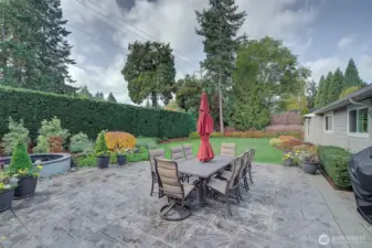 Great patio with lovely water feature off living area. Totally private rear yard with planting made to enjoy year around.