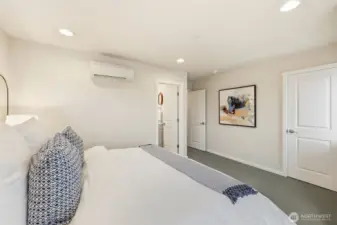 A primary bedroom that feels calm, open, and inviting.