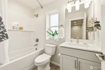 Guest bath with clean, modern finishes for convenience and style.