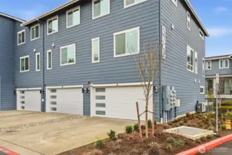 Thoughtfully designed exterior with driveway parking and a 2-car side-by-side garage.