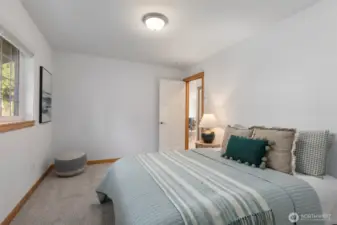 Queen size second bedroom with large closet