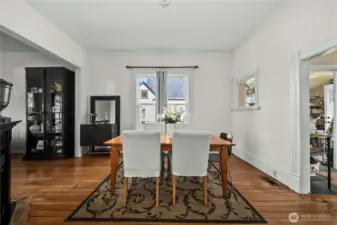Dining room with lots of light and tall ceilings