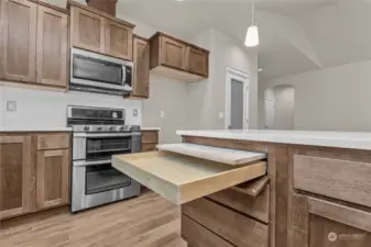 great features built in home, like this cutting board/ knife drawer,photo from similar plan, not actual